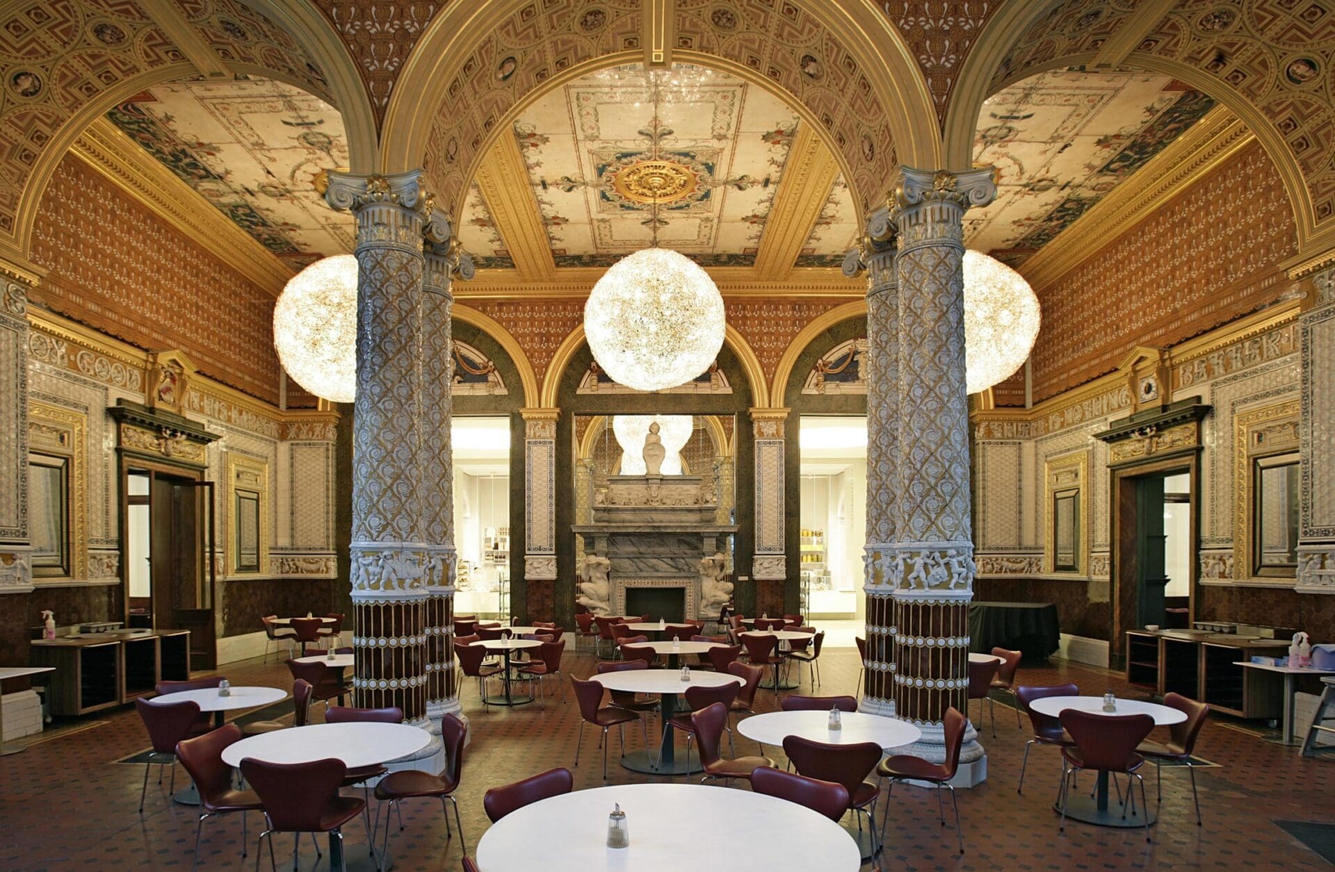 The best museums and galleries in London | An interior view of the ornate cafe inside the Victoria and Albert Museum.