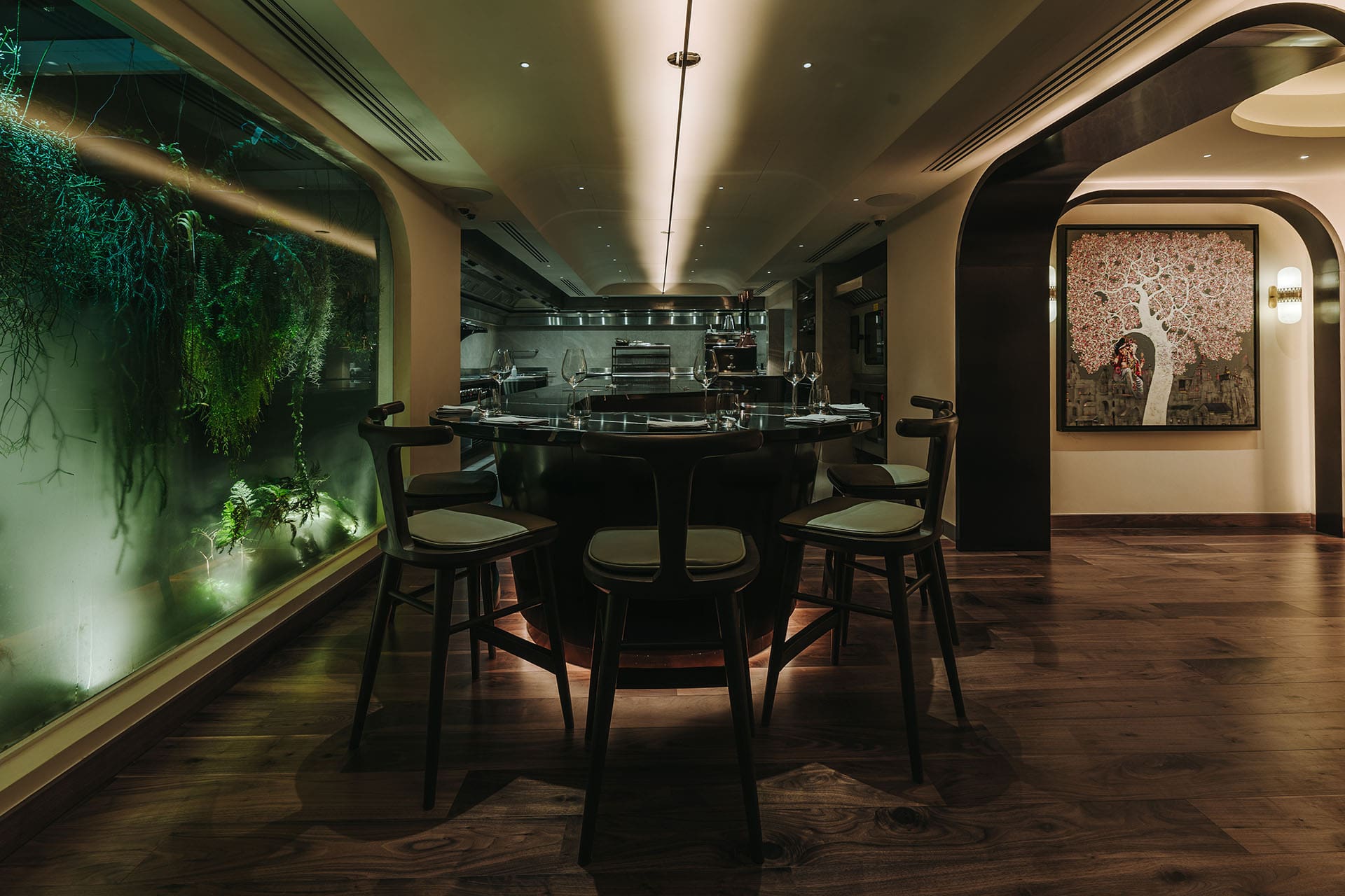 Inddee in Bangkok in the evening, framed by its garden