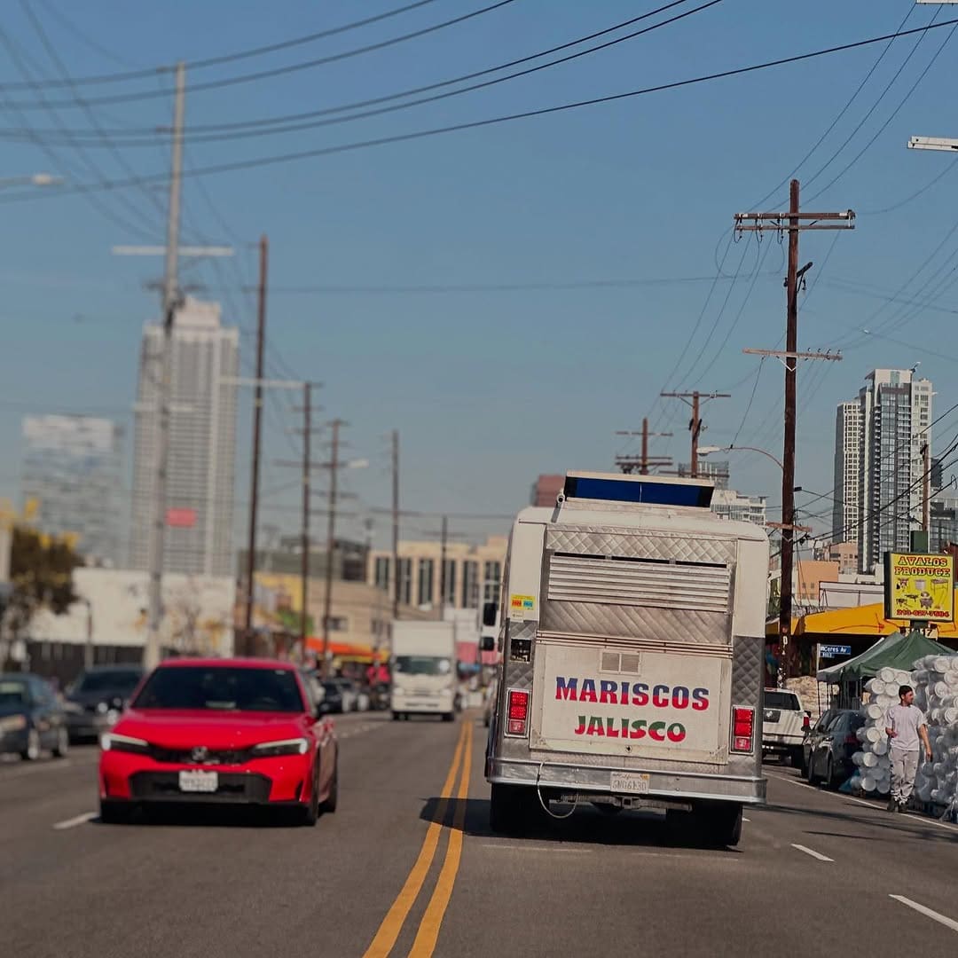 The Mariscos Jalisco taco truck on the move driving through LA