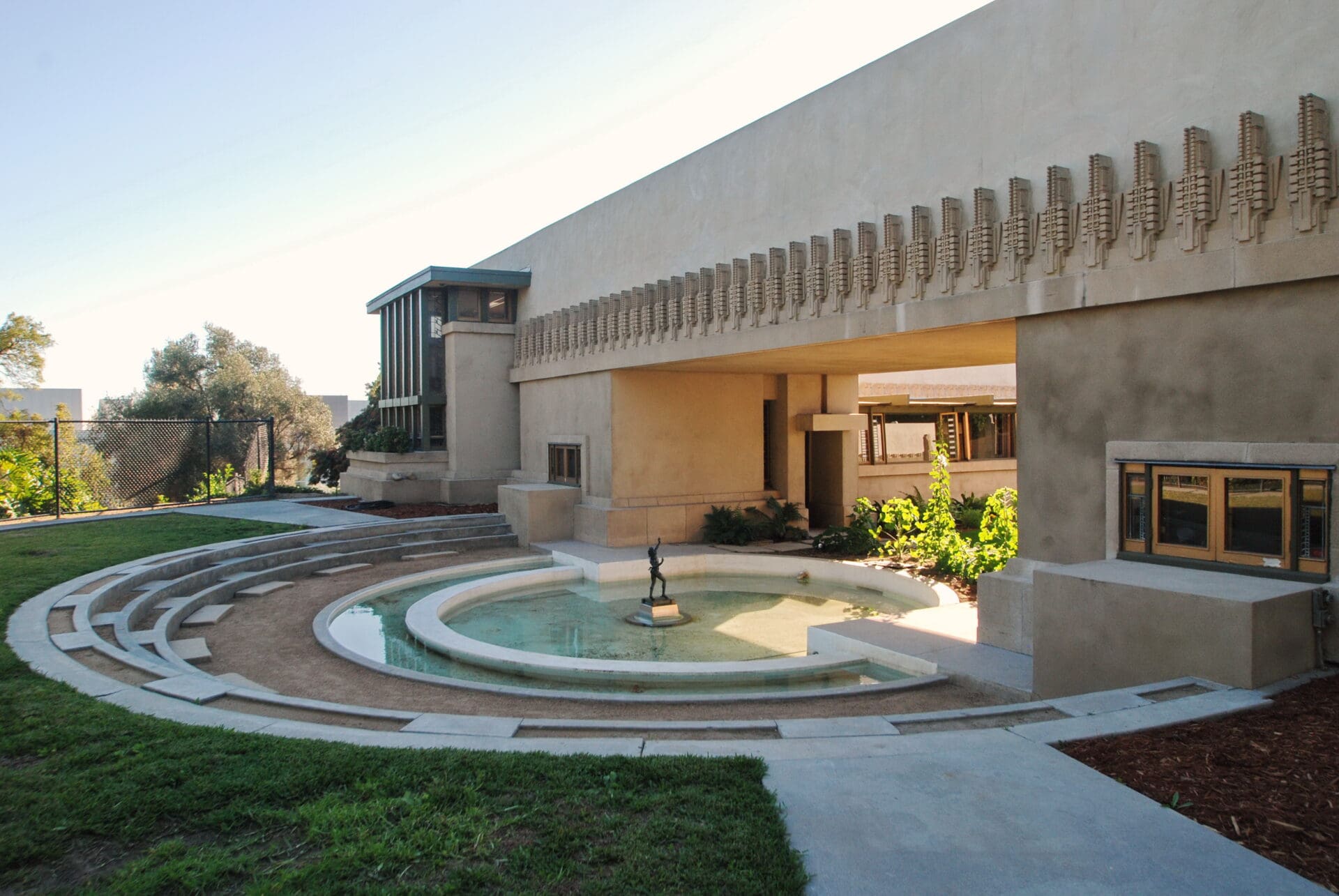 The best museums and galleries in LA | A view of the circular water fountain at Frank Lloyd Wright's Hollyhock House, with a small bronze statue at the centre