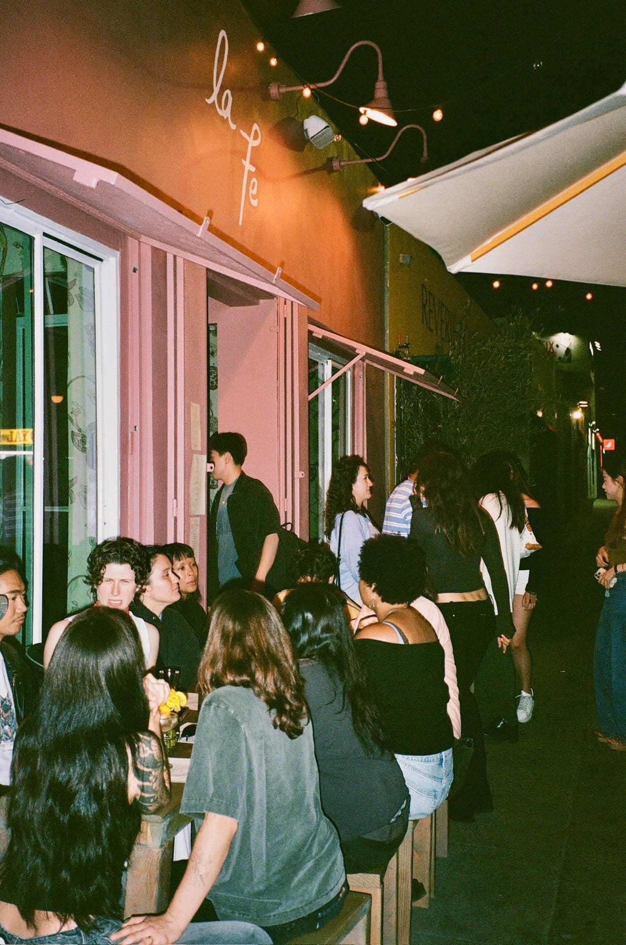 Drinkers outside La Fe in Echo Park, Los Angeles