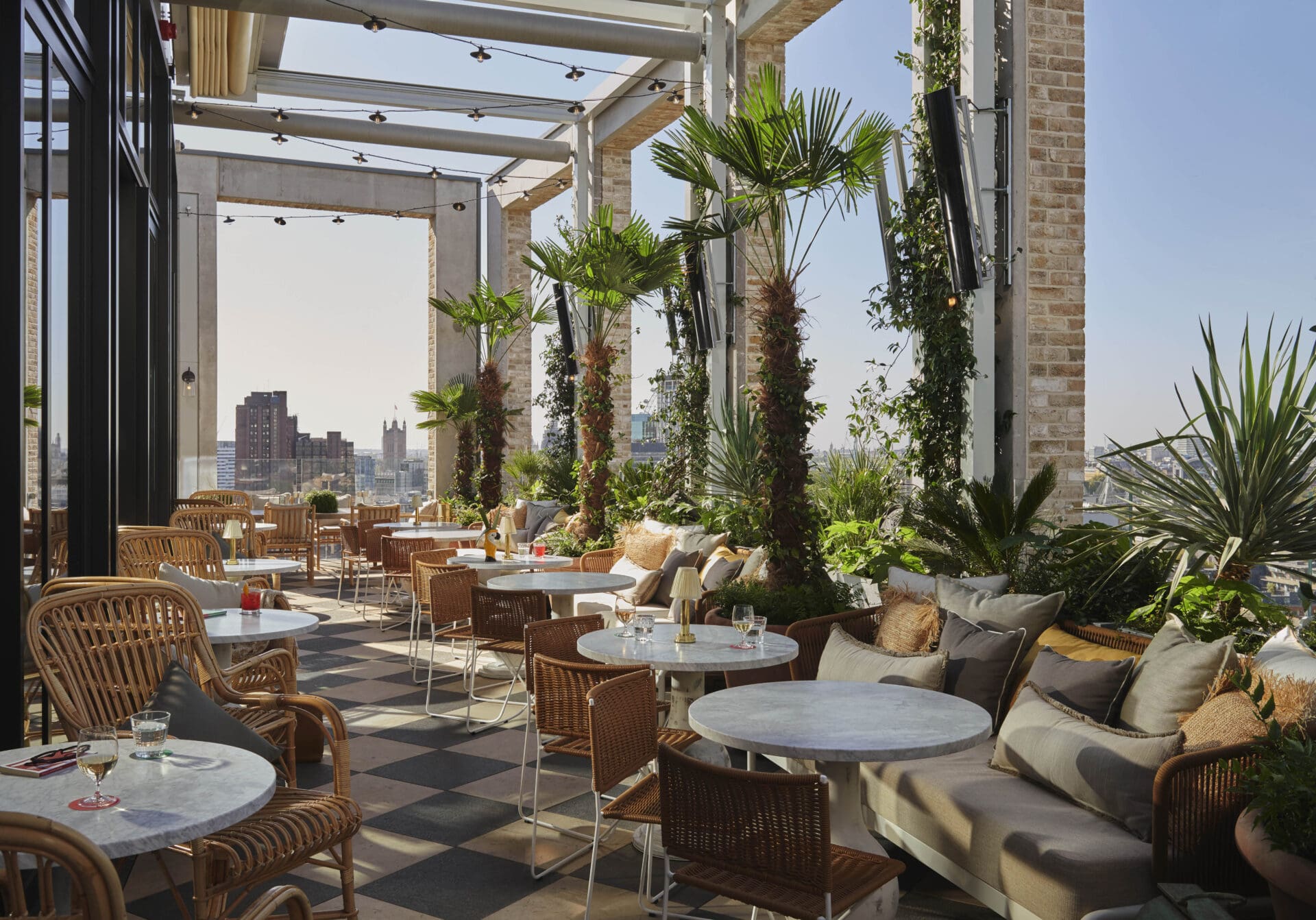 The best outdoor restaurants in London | The plant-lined, open-air terrace at rooftop restaurant Seabird located in The Hoxton, Southwark