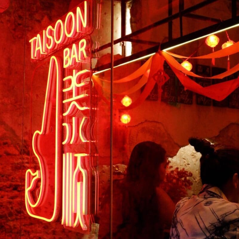 Bangkok's best bars | Red neon signage outside Tai Soon