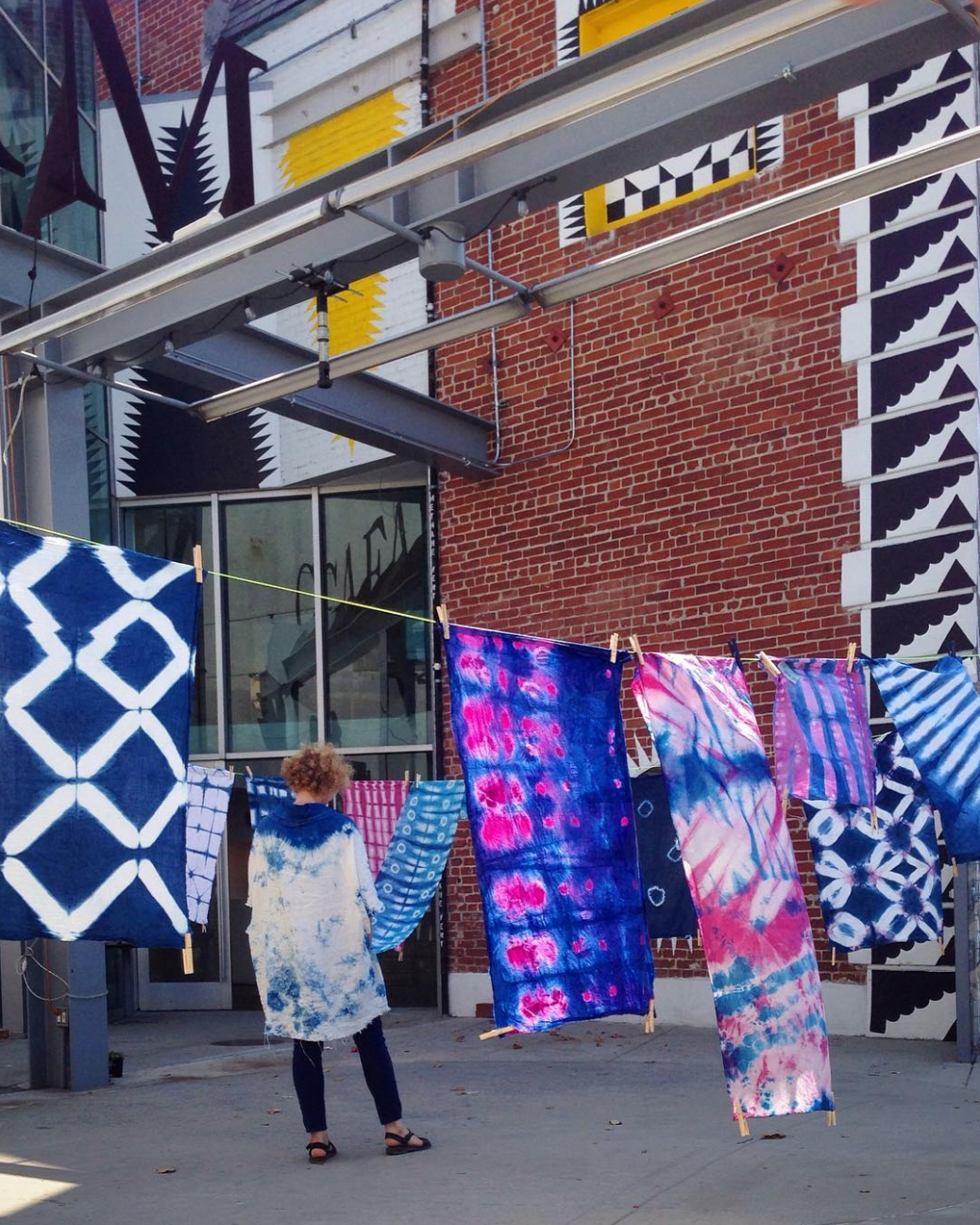Best LA museums and galleries | tie dye prints hanging out to dry outside Craft Contemporary