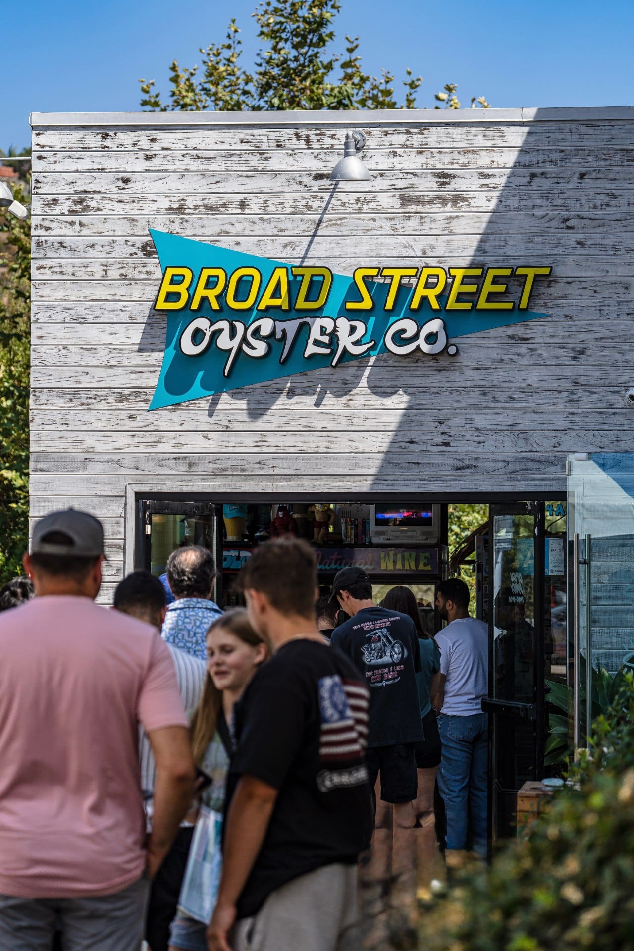 People outside Broad Street Oyster Co. in Los Angeles