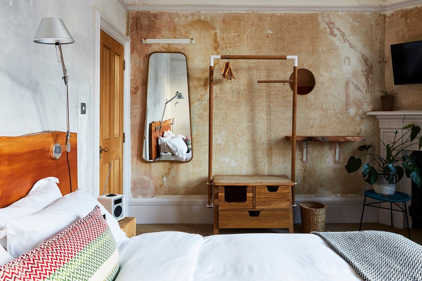 Exposed plaster walls at The Culpeper in Spitalfields