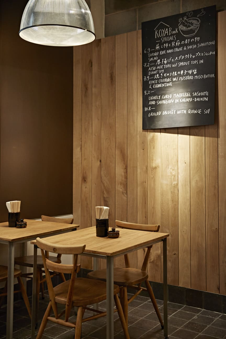 Shuko Oda | Wooden chairs and table in the interiors at Koya City