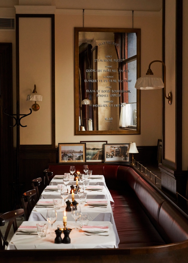 Candlelit tables, vintage mirrors and banquettes at French bistro Josephine
