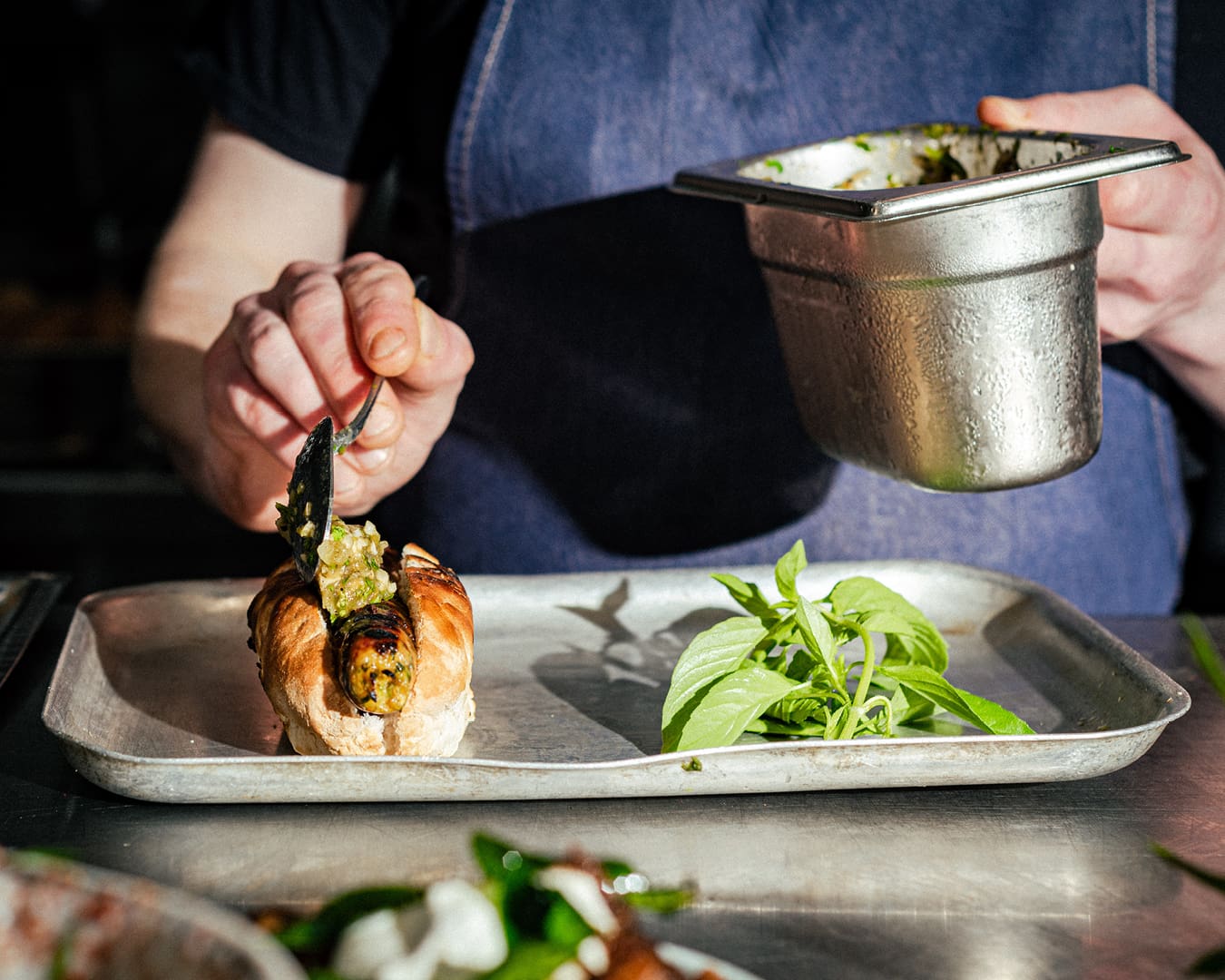 A Chiang Mai-style hot dog served with curry for French dipping at Khao Bird in Borough Market