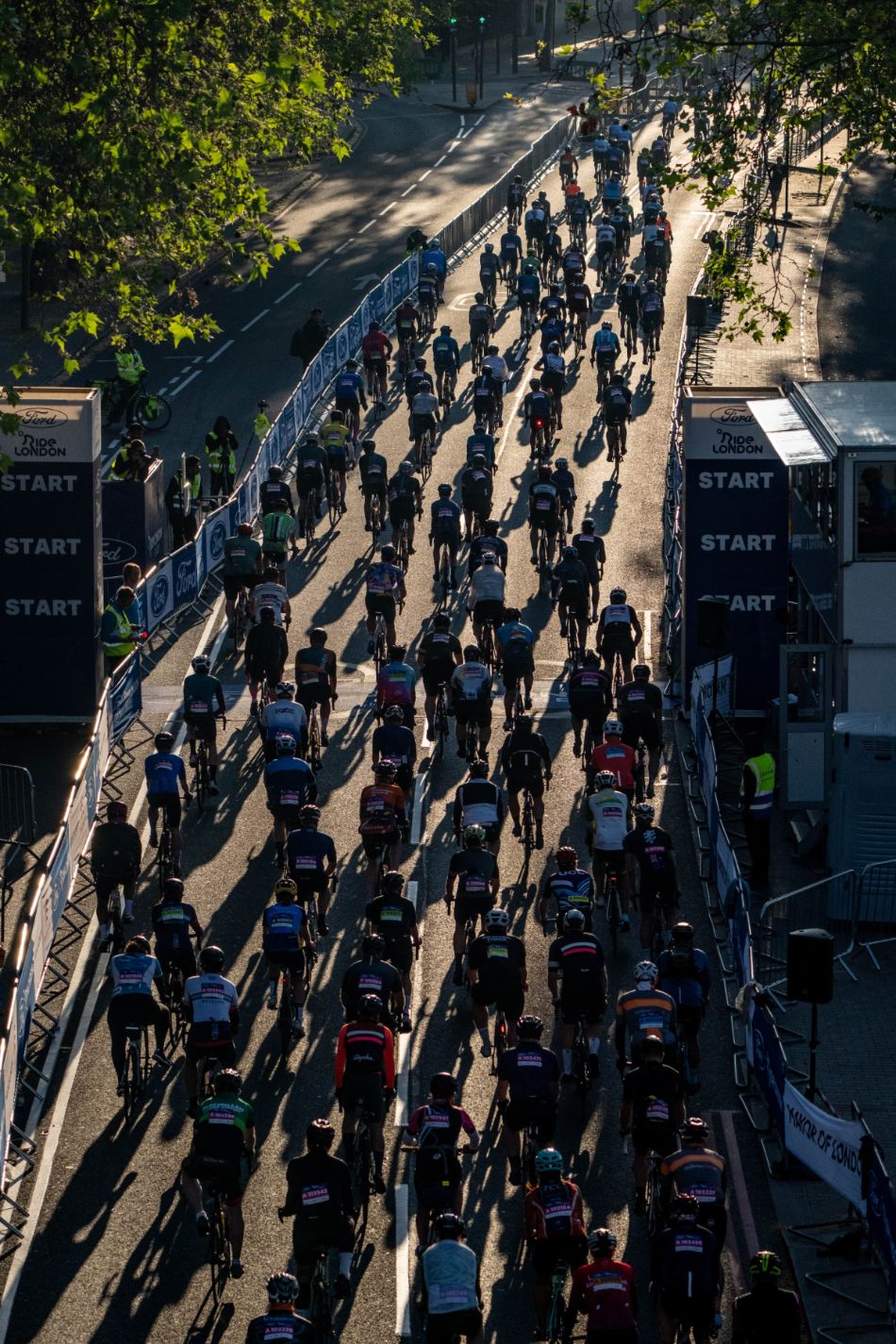 A group of cyclists at RideLondon pictured at sunset