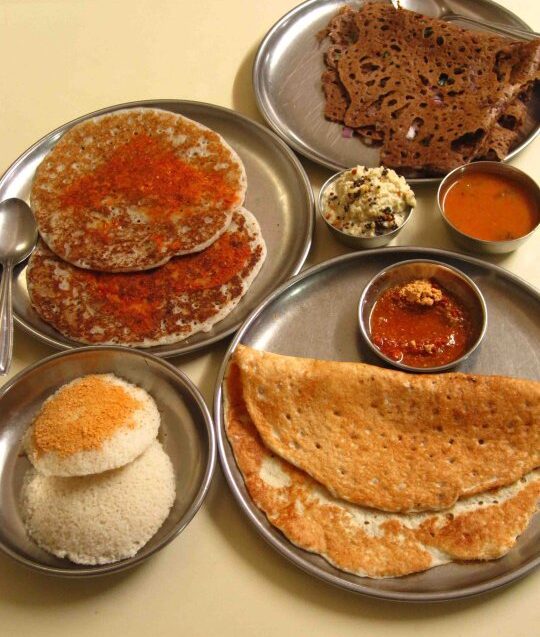 Best restaurants Mumbai | A selection of dishes served at Cafe Madras, include a dosa, some sauces and more