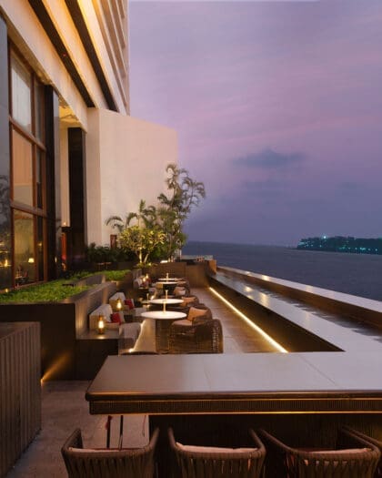 A hotel bar exterior overlooking the river in Mumbai