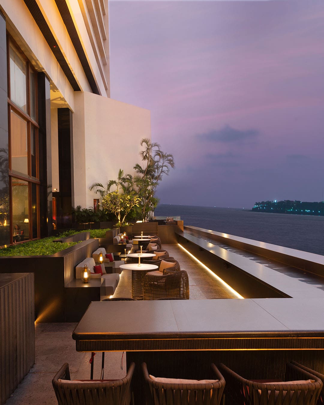 A hotel bar exterior overlooking the river in Mumbai