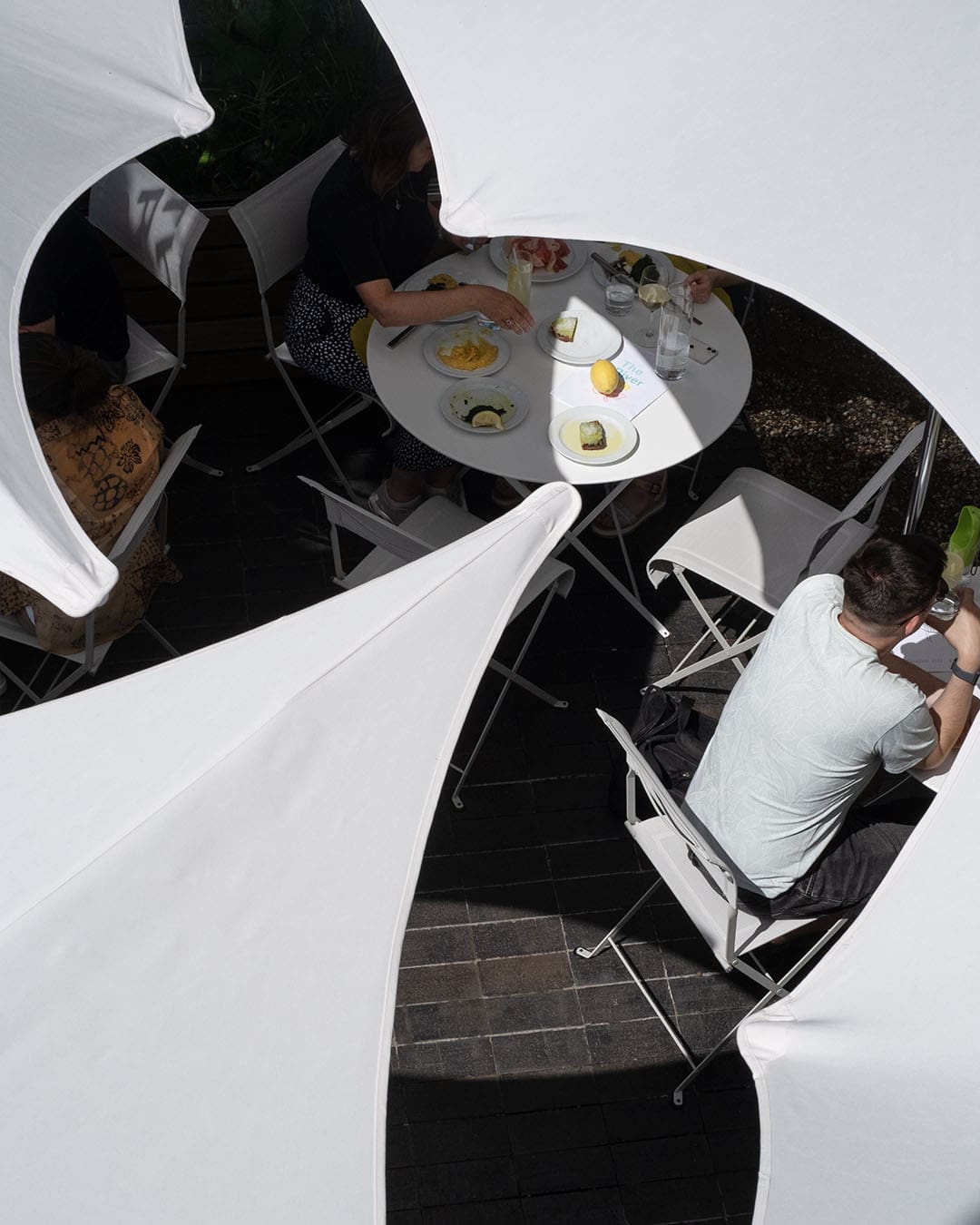 People eating and drinking at The River Cafe Cafe