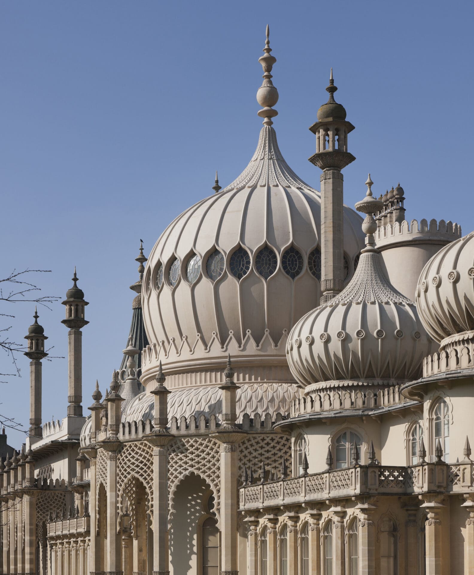 Things to do in Brighton | A sunny day at Brighton Pavilion, built in the Indo Saracenic style with white domes and minarets