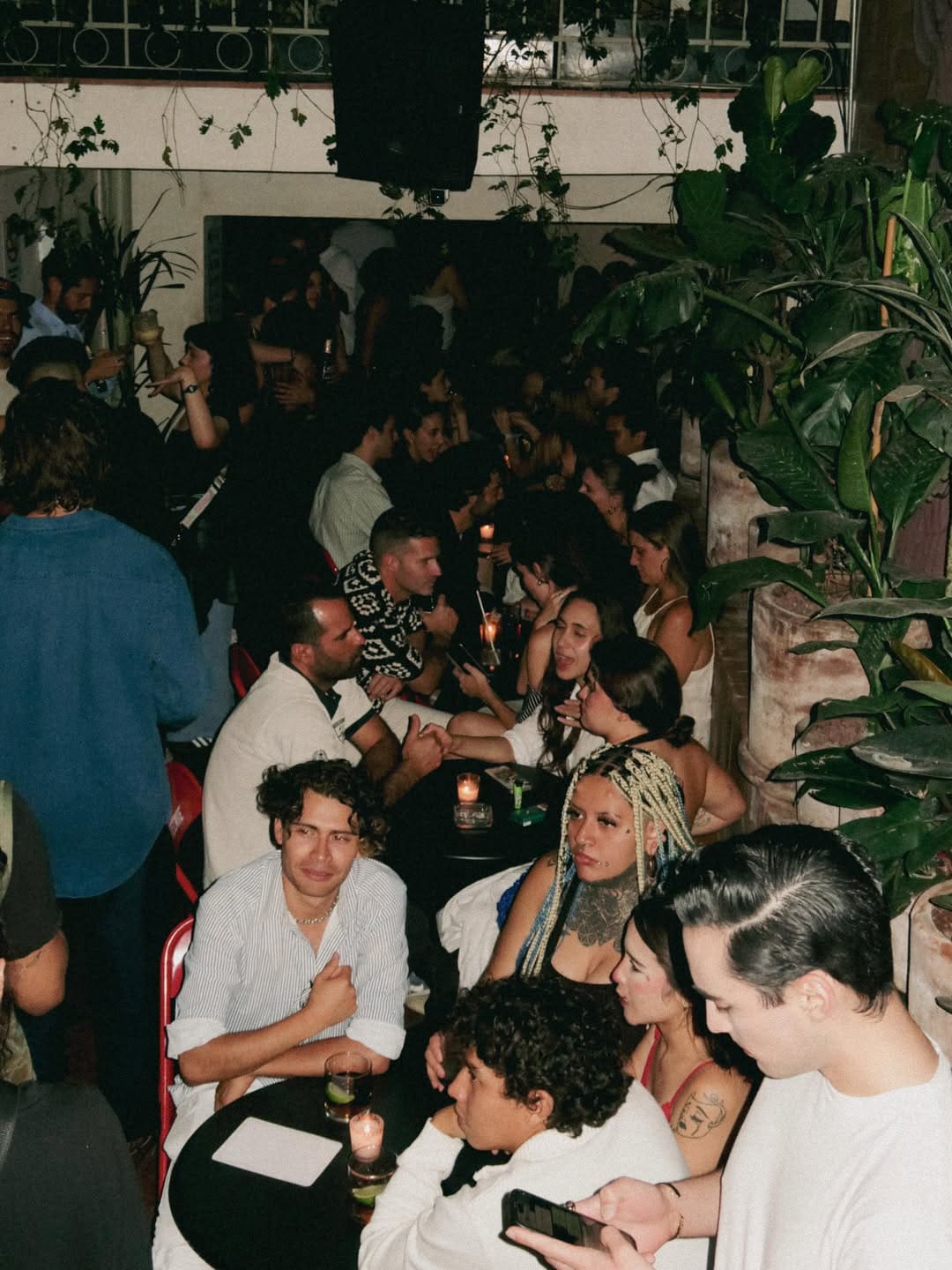 Crowds drinking at Travieso Travieso Travieso in Mexico City