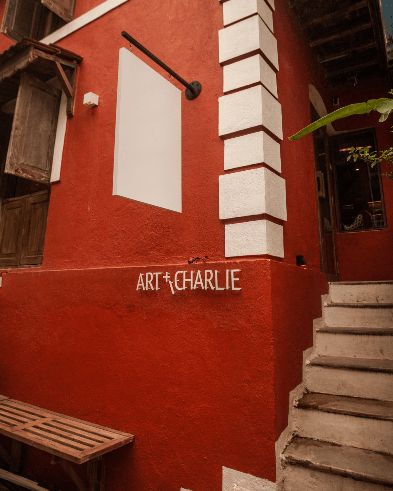 The best things to do in Mumbai | The terracotta exterior of Art and Charlie