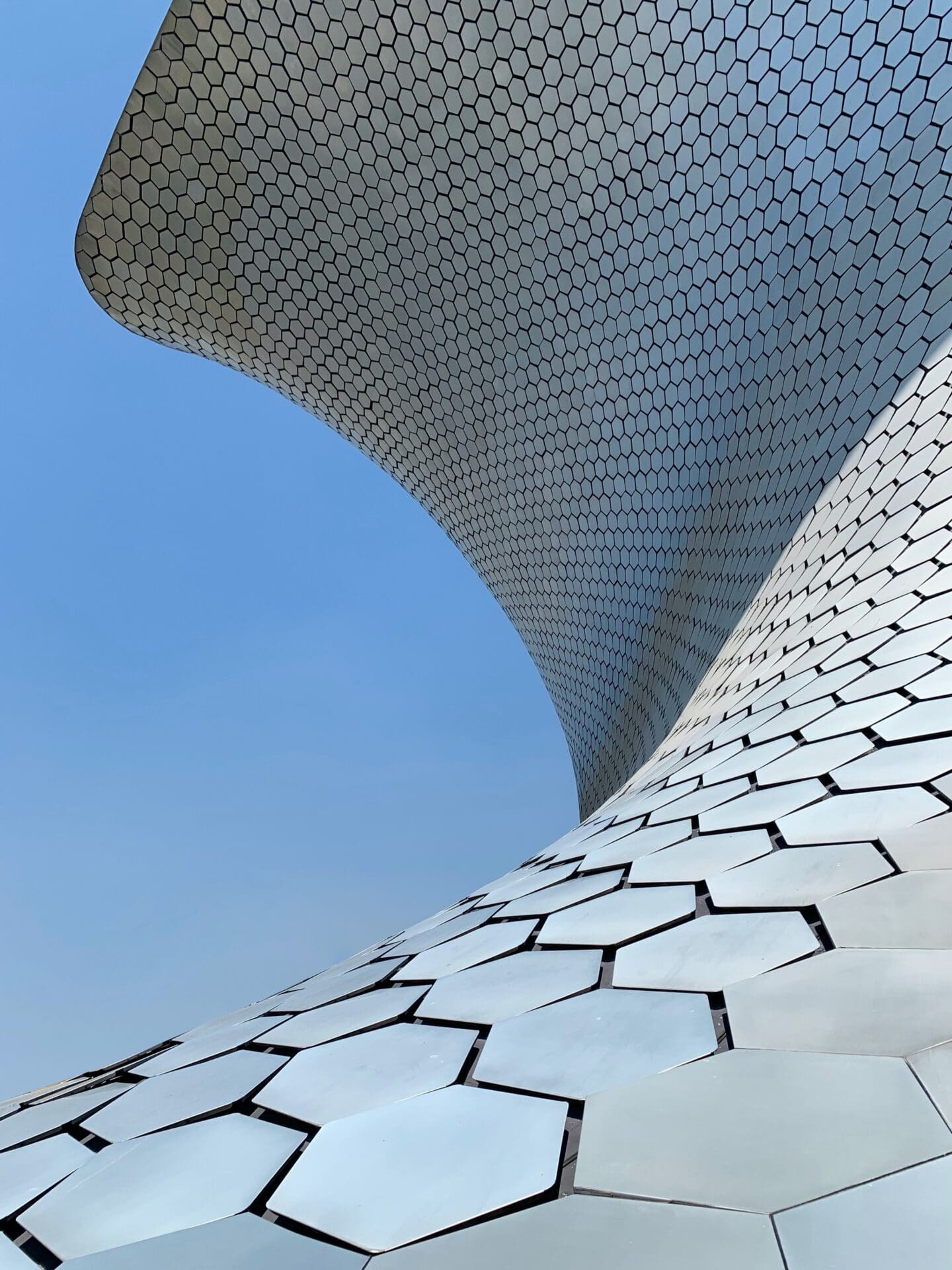 Local's guide to Mexico City | Curved hexagonal metal panels on the side of Mexico City's Museo Soumaya