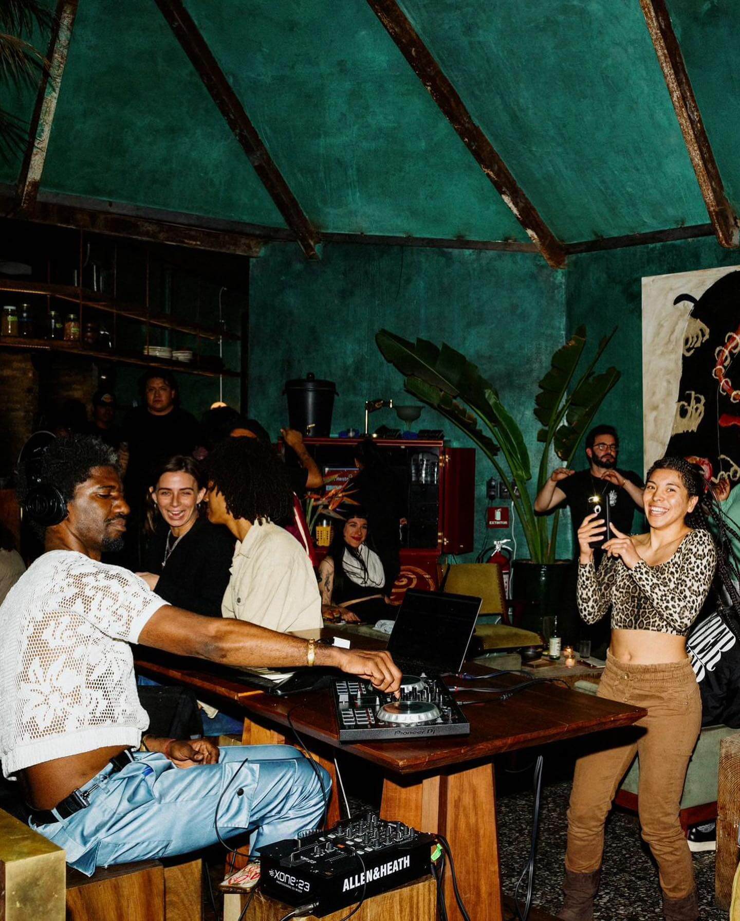 Best bars in Mexico City | A crowd of people enjoy a DJ set at Salón Palomilla