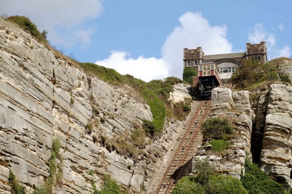 A weekend in Hastings | A view of the funicular railway track cutting up between rocky cliffs to the terminal at the top of the hill