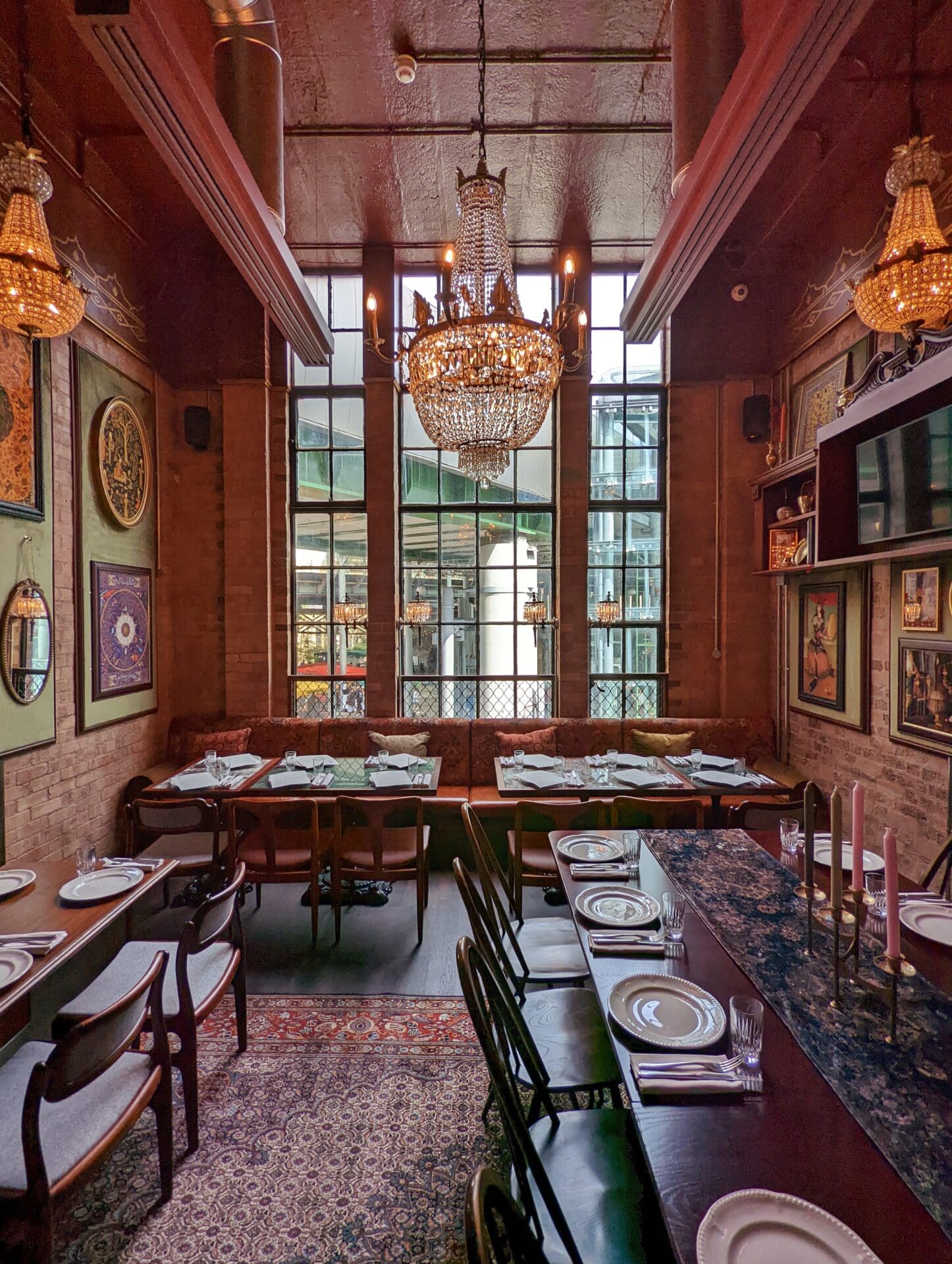 Best restaurants in London Bridge and Borough | The dining room at Berenjak, with artwork adorning the walls and Persian rugs over the floors