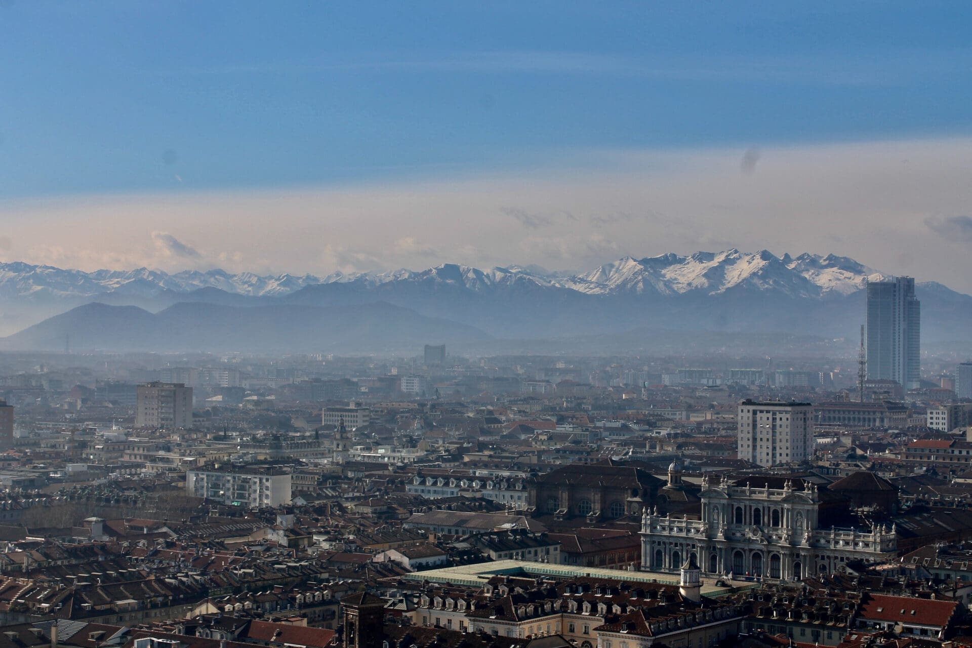 Cultural tours for the modern age | A view over a city with snow-capped peaks in the background