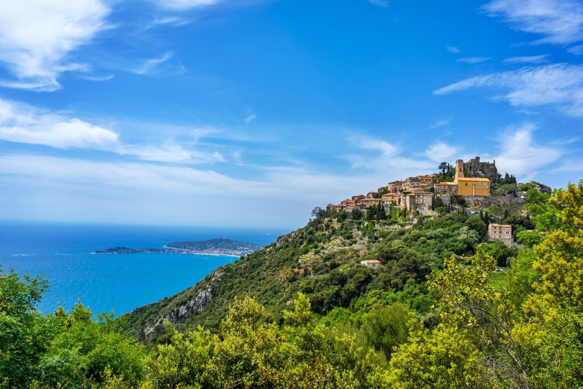 Running in Nice | Éze sits atop a mountainous hillside against the ocean in Nice, France