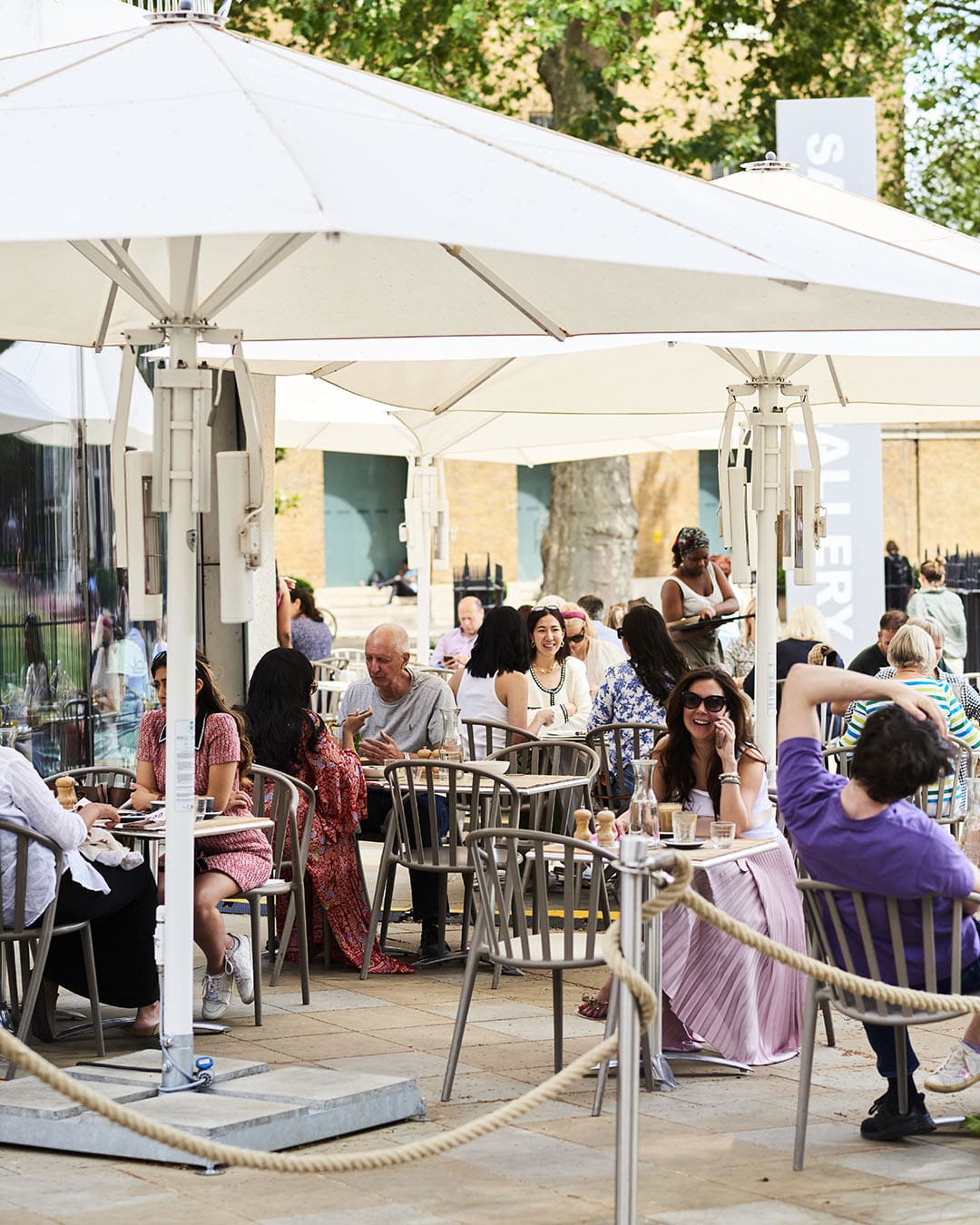 People enjoying coffee and drinks at Vardo on Duke of York Square in Chelsea