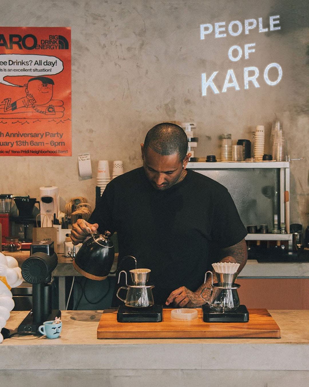 Karo's charismatic founder Karo Iyash behind the coffee bar in Bangkok