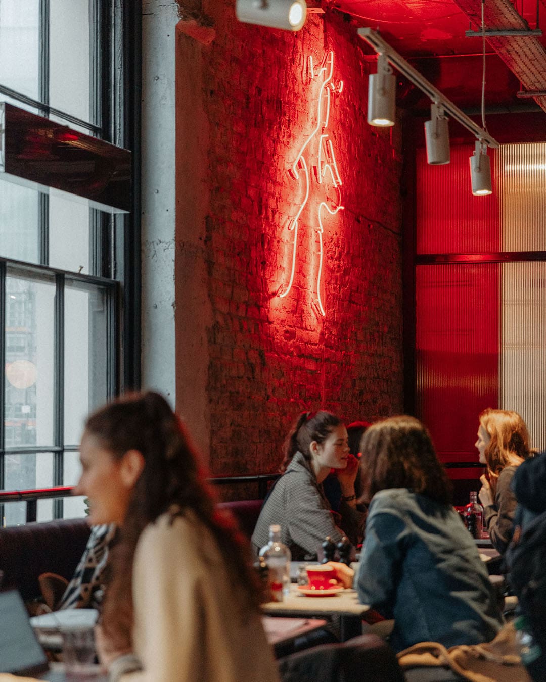 Customers enjoying coffee at the London Bridge venue of Grind