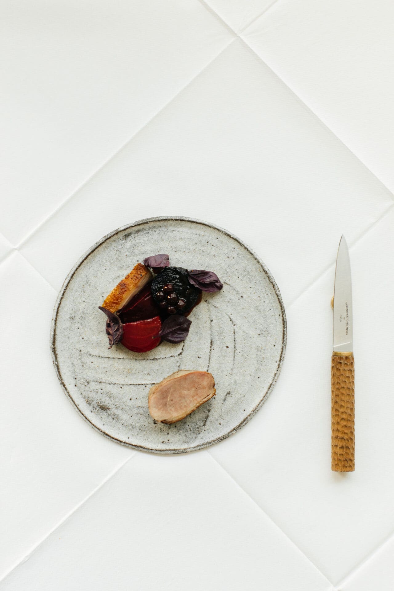 The best restaurants in Bruton | a dish as Osip on a ceramic plate against a white backdrop