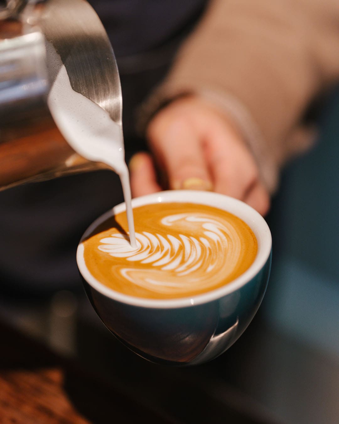 A delicious Latte being prepared by a barista at Redemption Roasters in Kings Cross / Best coffee shops in London