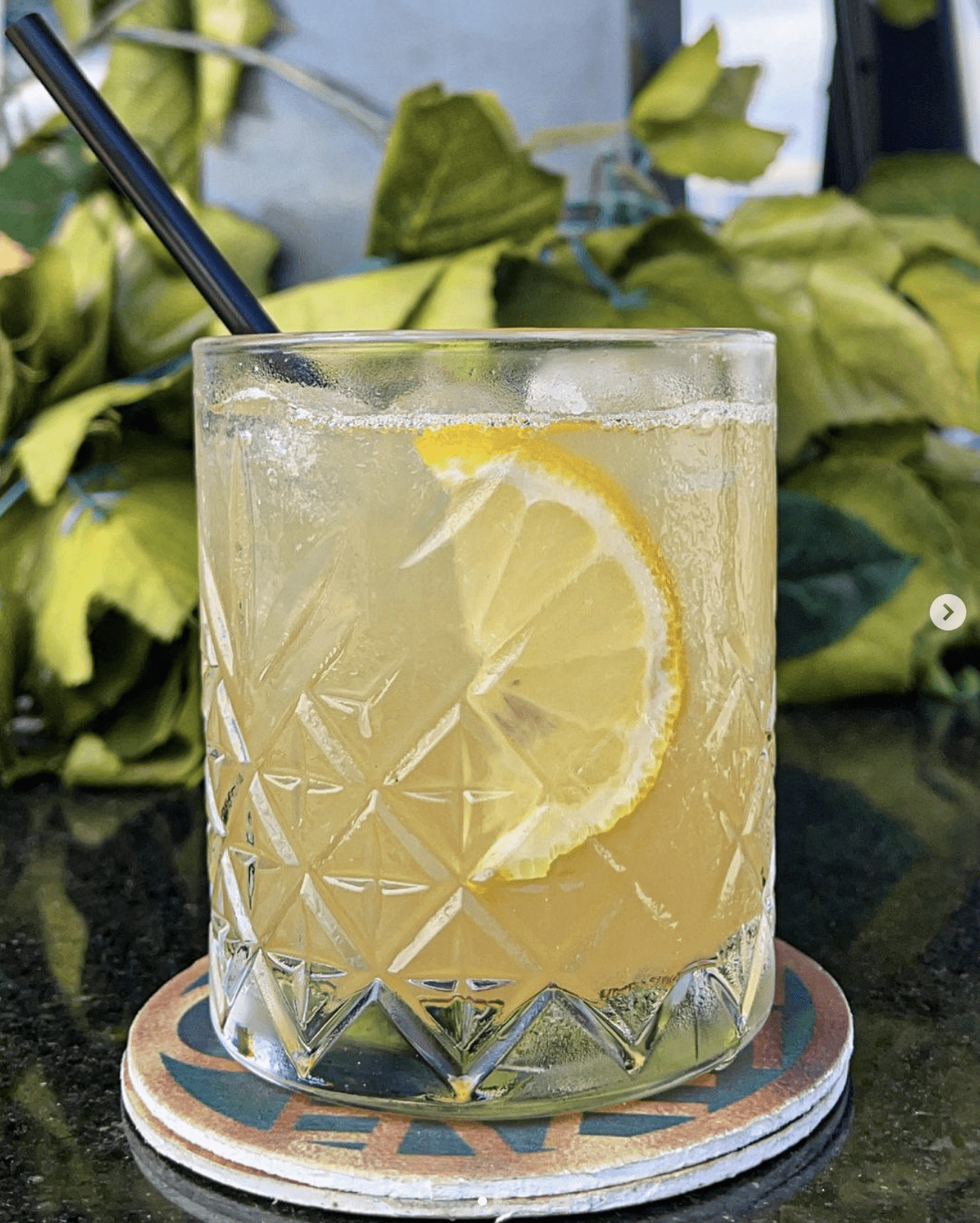The best bars in Lagos | A yellow-toned cocktail at Atmosphere Rooftop