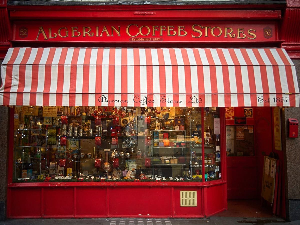 The red exterior of Algerian Coffee Stores, a London Soho institution