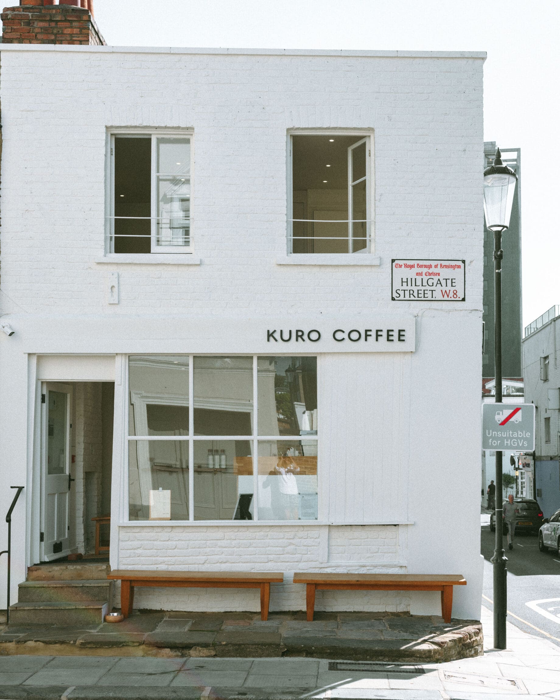 The best coffee shops in London | whitewashed exterior of Kuro coffee in Notting Hill