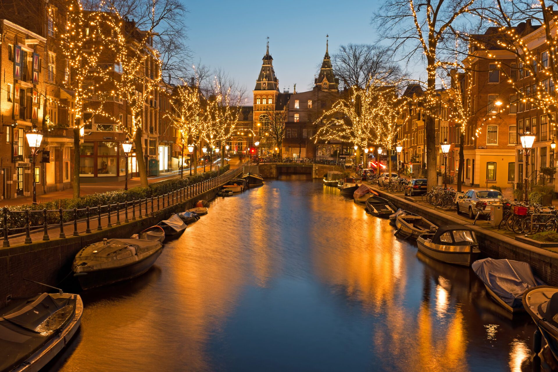 The best Christmas markets in Europe | the canal in Amsterdam at twilight