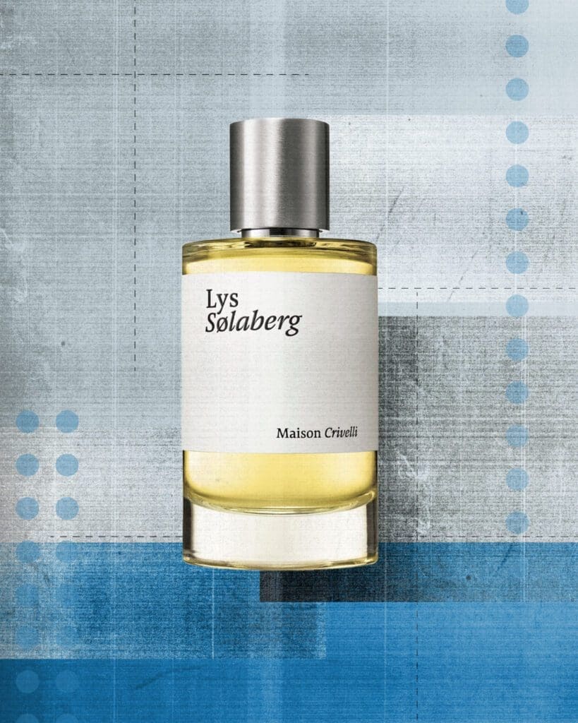 Travel-inspired fragrance | a bottle Lys Sølaberg by Maison Crivelli against a blue backdrop