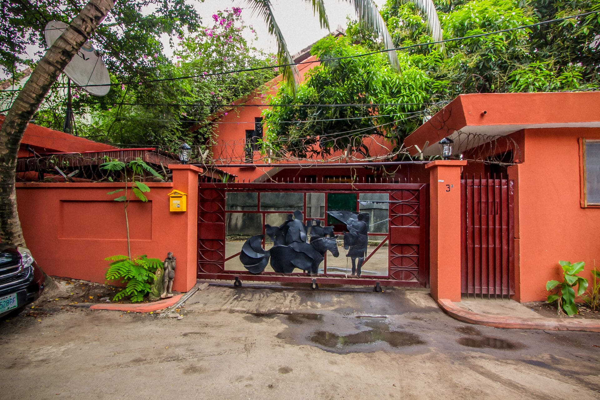The best art galleries in Lagos | brightly painted terracotta exterior of African Artists Foundation