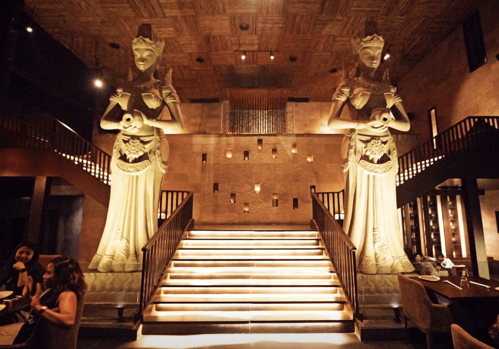The best restaurants in Lagos, Nigeria | dramatic sculptures flanking the stairs at Pan-Asian restaurant Shiro