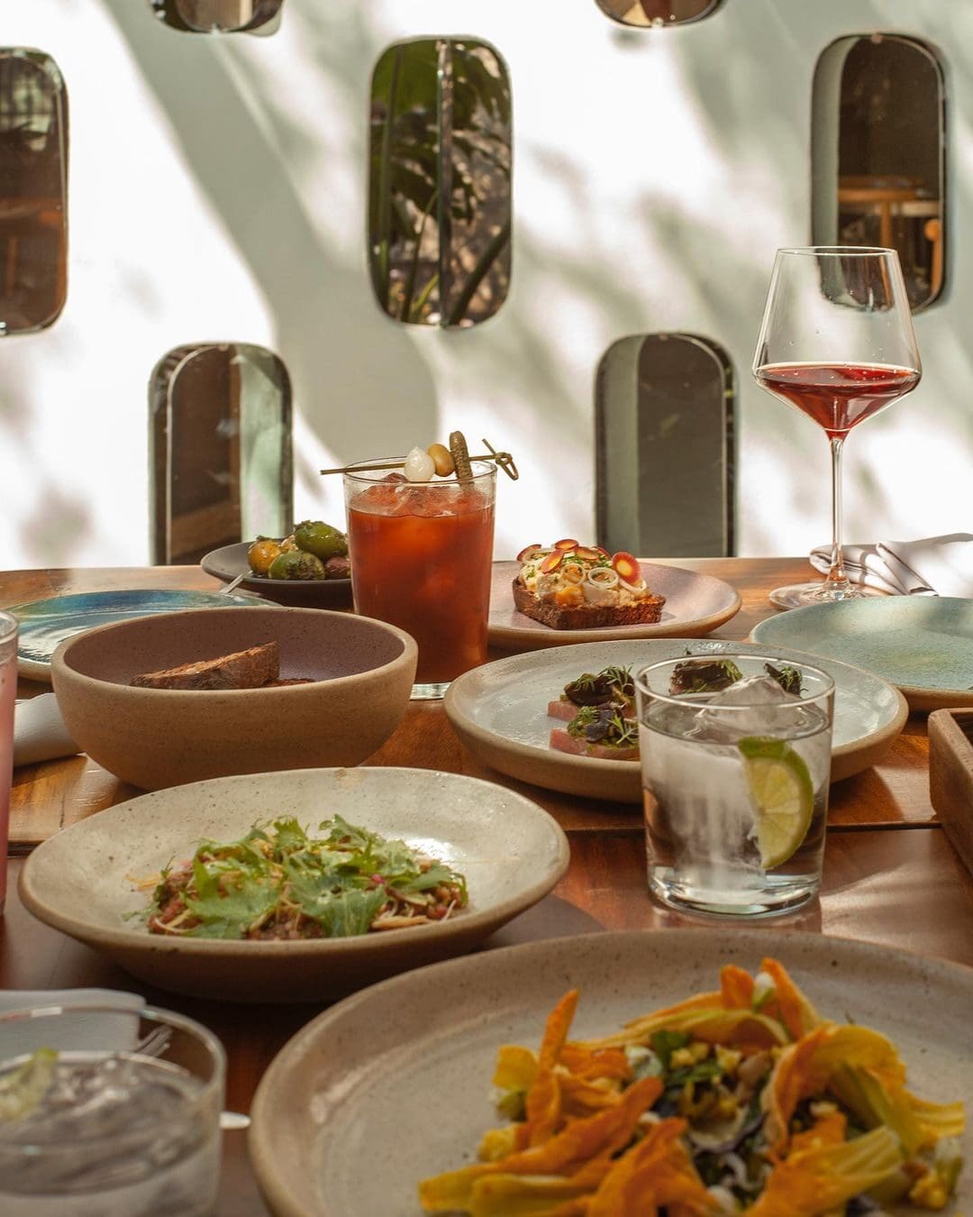 The best restaurants in Roma Norte, Mexico City | plates of vibrant food and drinks