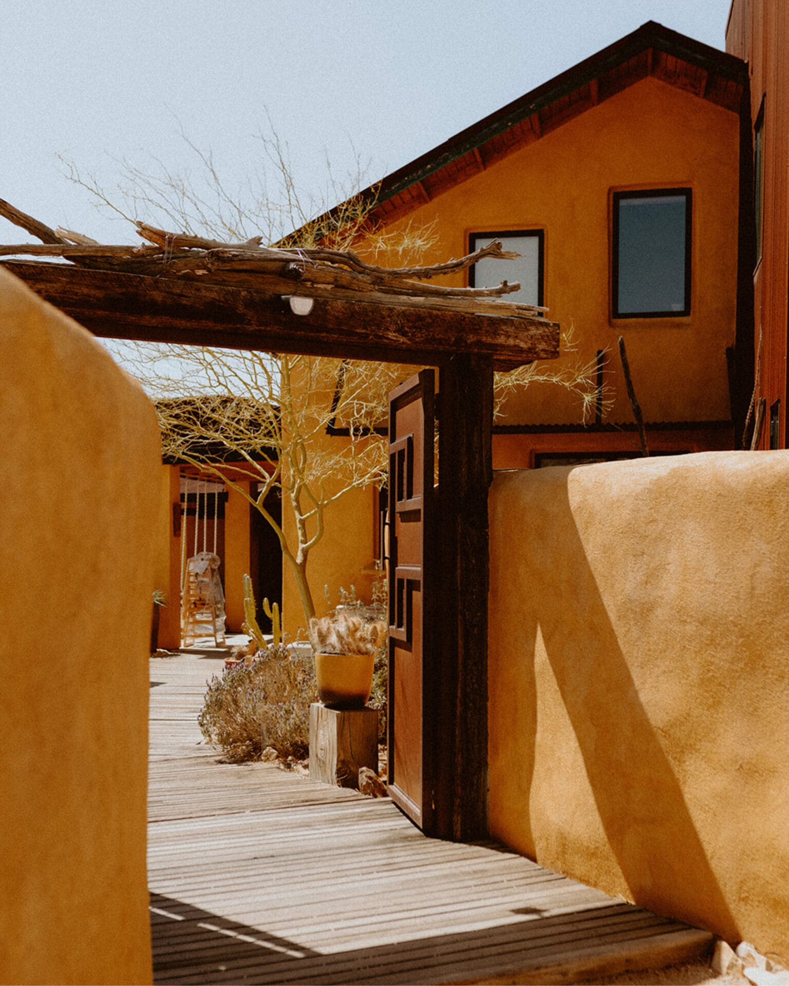 The best things to do in Joshua Tree | The bright, sun-bleached entrance to Sacred Sands hotel