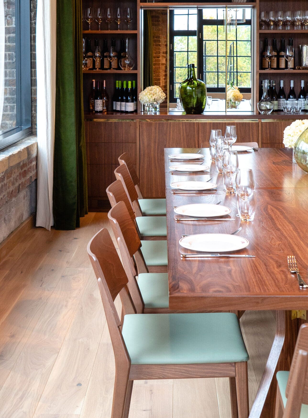 The best private dining rooms in London | Wooden tables and chairs at the private dining room of Barrafina in Borough Market