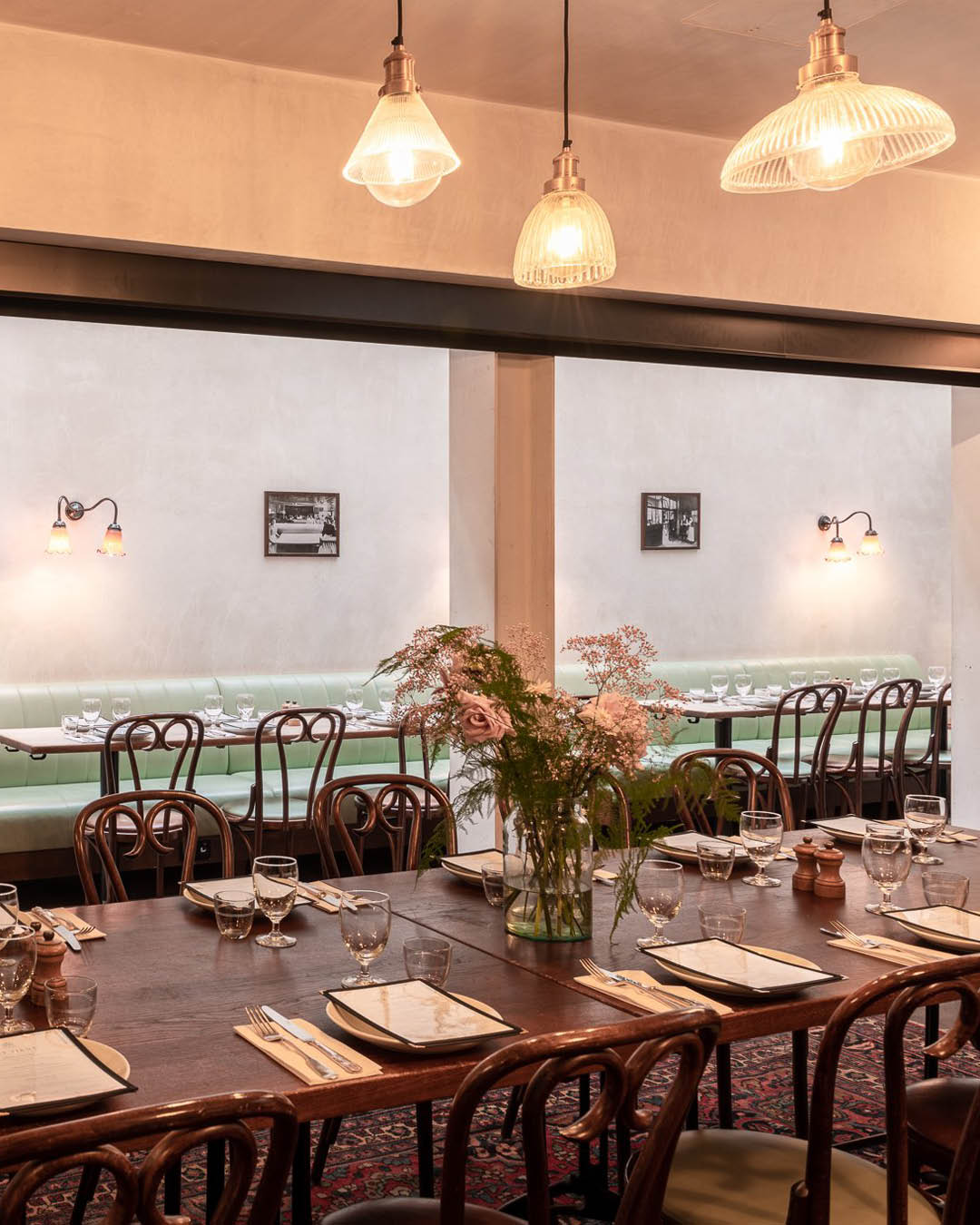 The best private dining rooms in London | Duck-green banquettes and dark wooden tables decorate the private dining room at The Laundry in Brixton