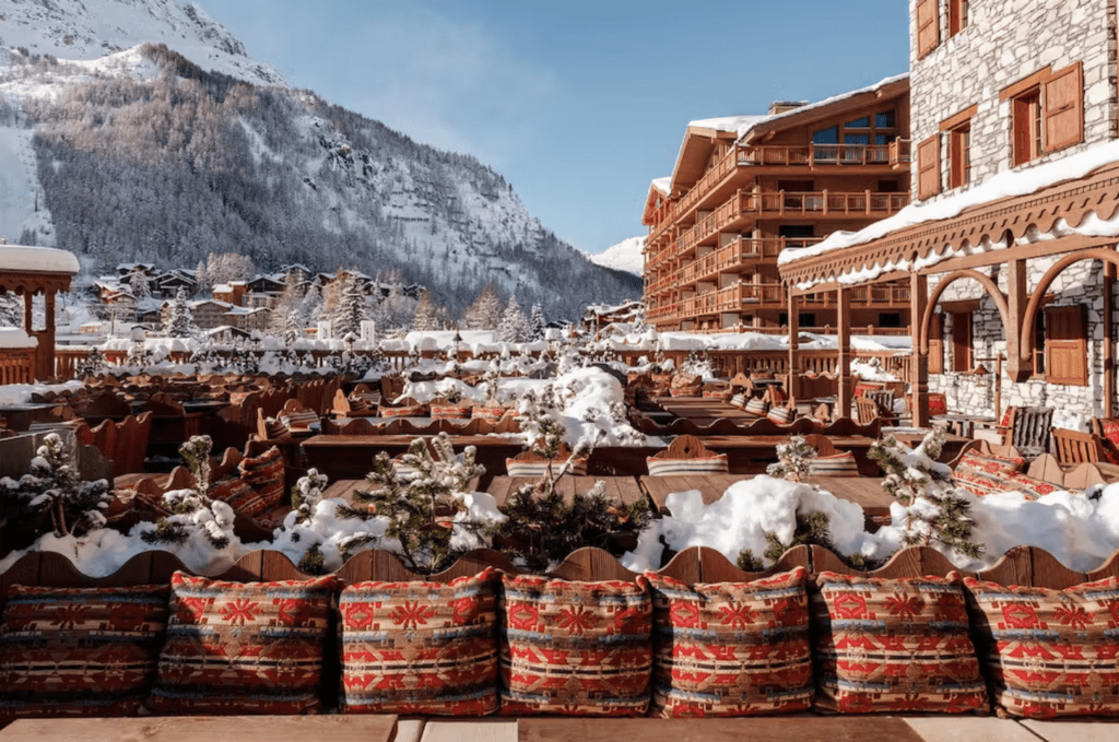 The most spectacular places to stay in the Alps this winter | The sunlit terrace at Loulou's restaurant at Airelles Val d'Isère