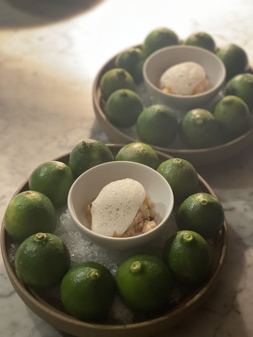 Two bowls of limes on ice at the Kata Food Festival in Malaysia