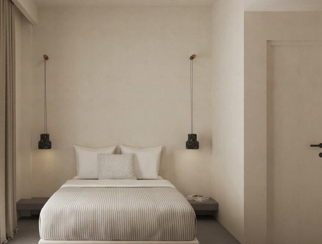 The best new hotels for 2023 | a minimalist bedroom at Nōstos Serifos in Greece