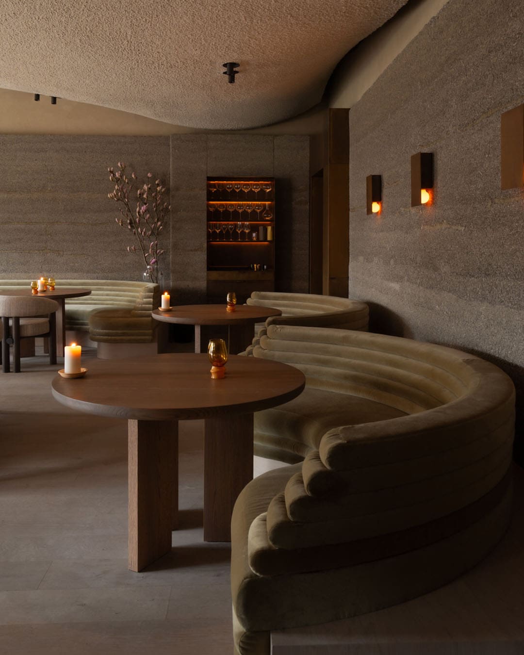 Undulating curves and earthy tones at Flore fining dining restaurant in Amsterdam