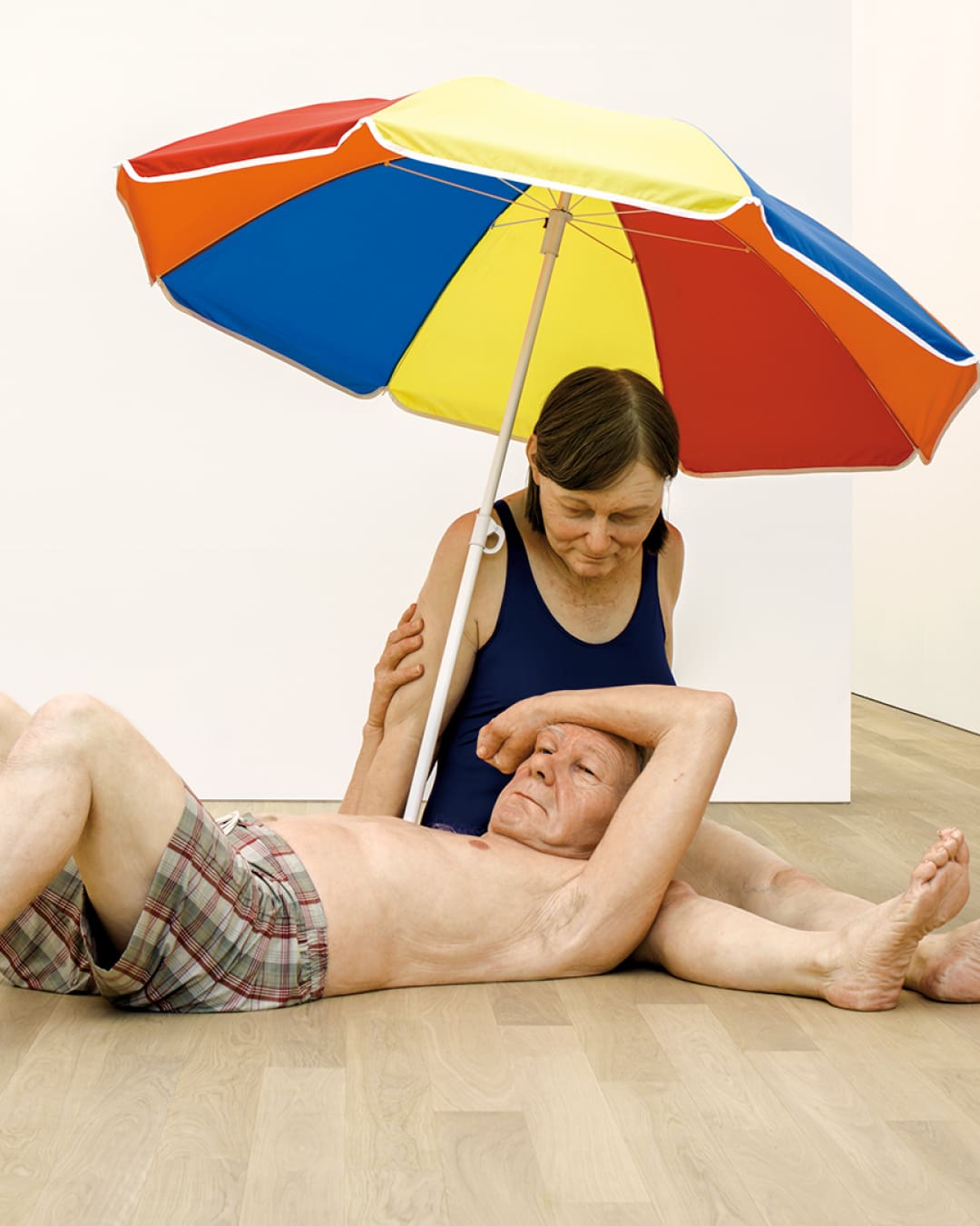 The best museums and art galleries in Amsterdam | The sculpture Couple Under an Umbrella by Ron Mueck on display at Museum Voorlinden
