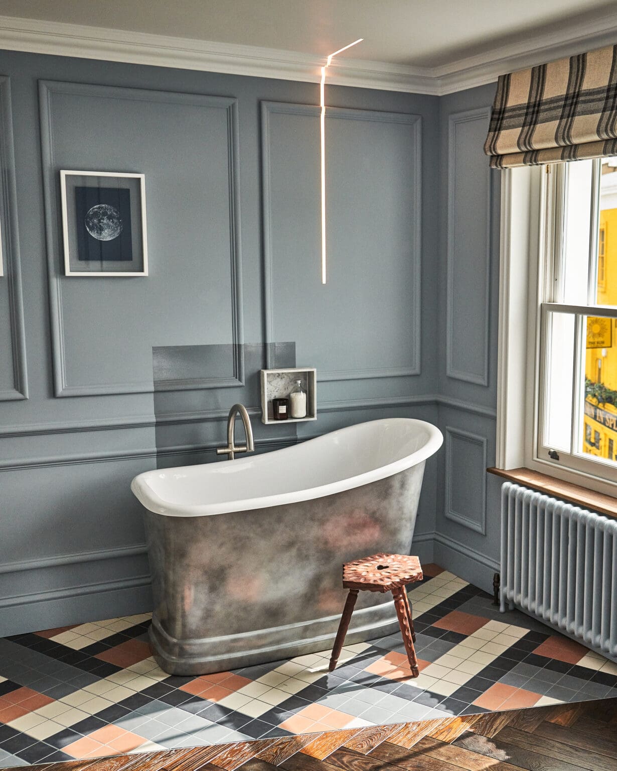 The Lost Poet, Notting Hill London | A silver freestanding tub on a tiled floor
