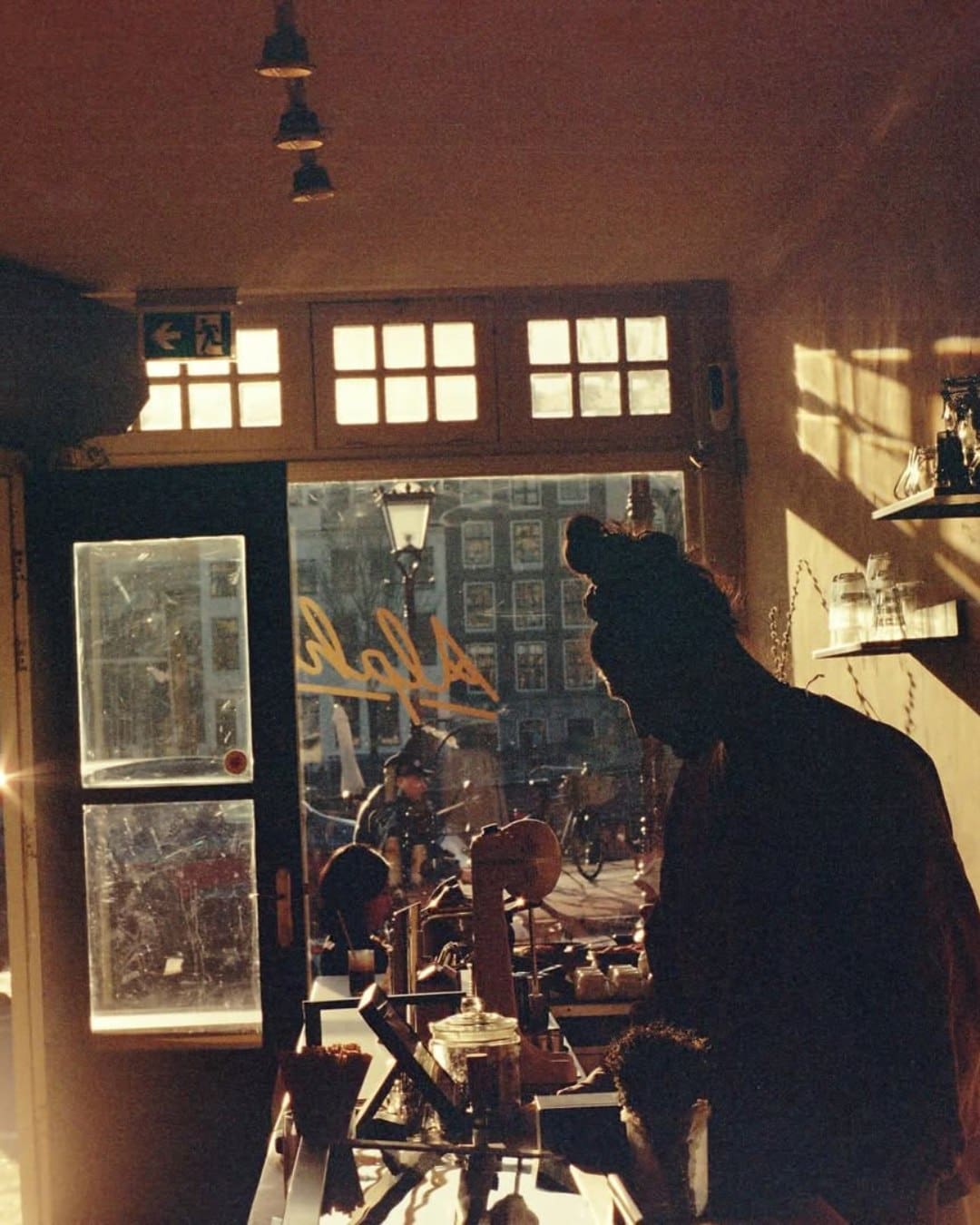 Sun-dappled tones at Greek cafe Alpha in Amsterdam